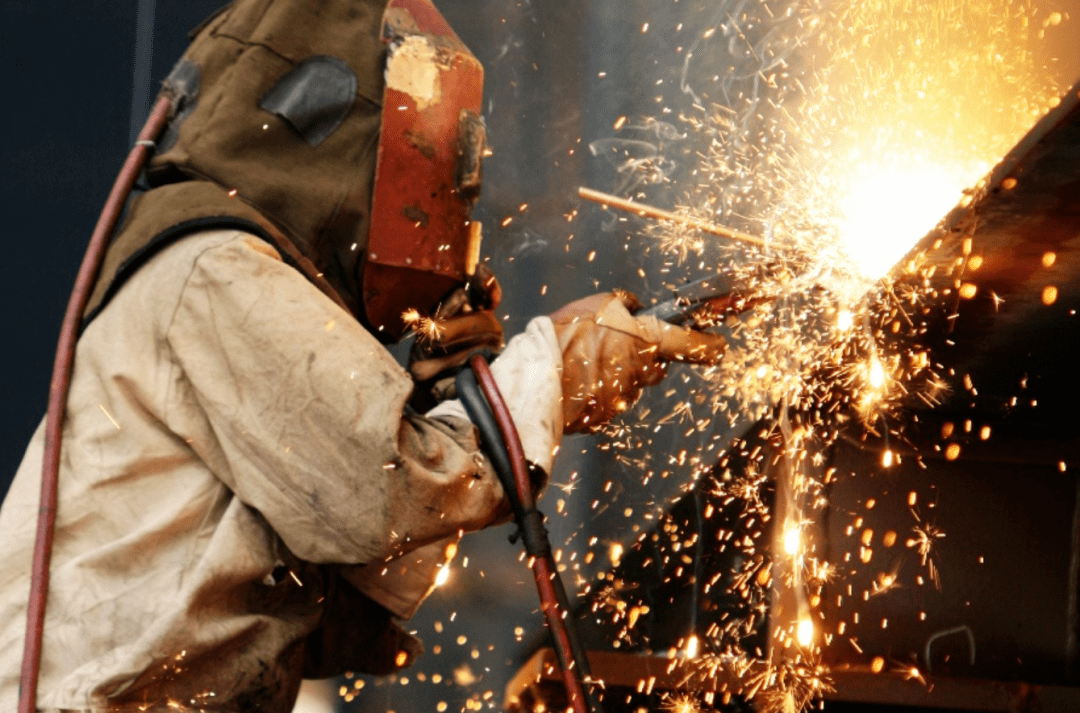 How should we extinguish a fire when the electric welding equipment catches fire?