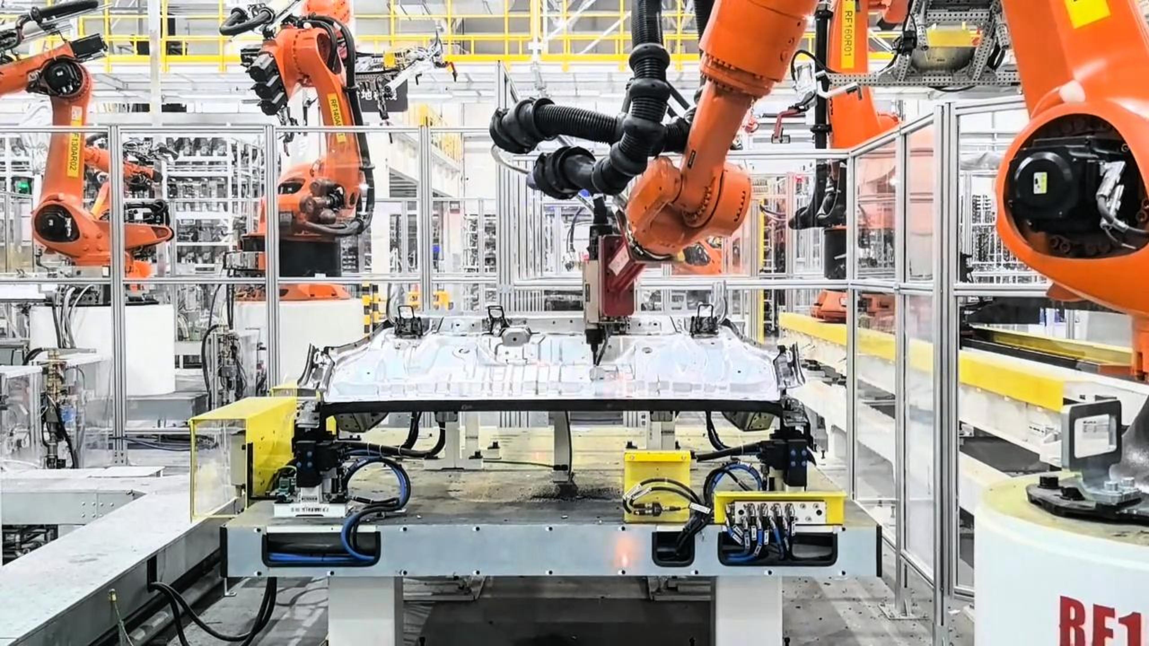 Robotic resistance spot welding in automotive production with controlled welding parameters